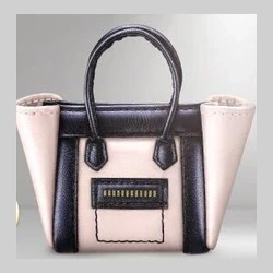 Pale tote with dark handles