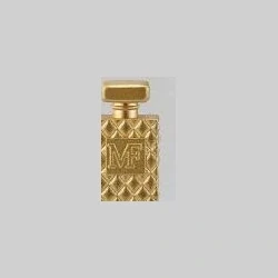 Gold patterned perfume bottle