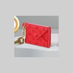Red embossed mini clutch with gold chain